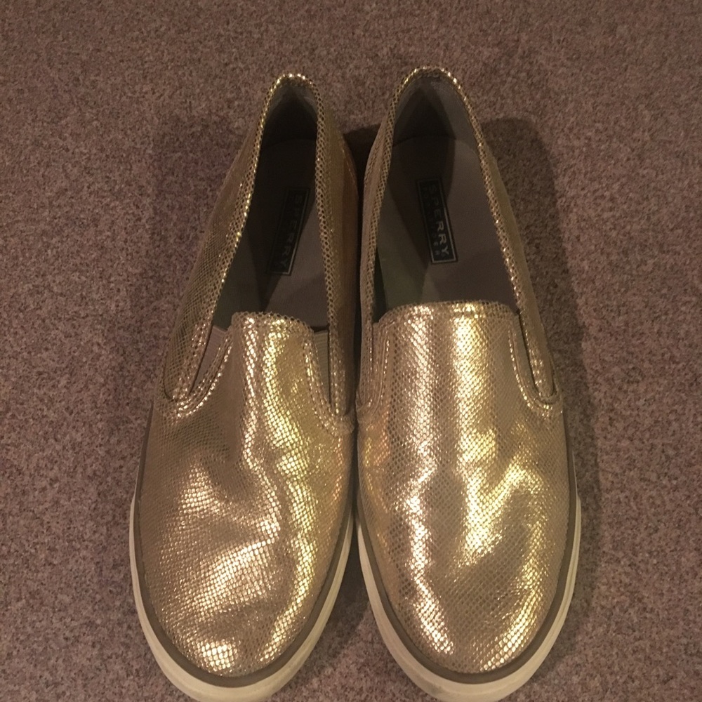 Sperry- top sider gold loafers.